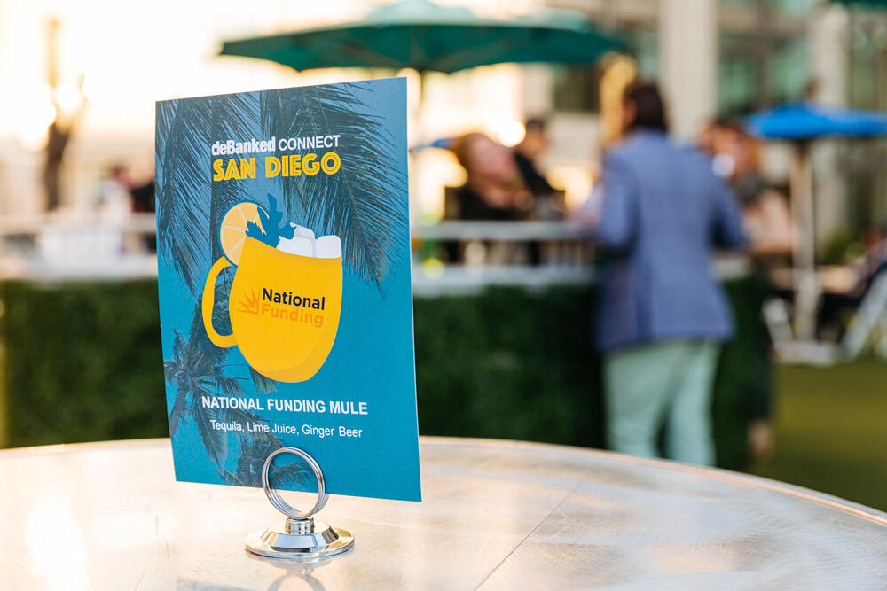 deBanked CONNECT Event Table Signage